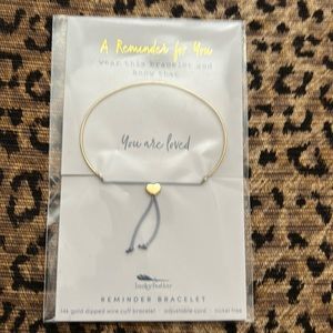 Lucky feather reminder bracelet